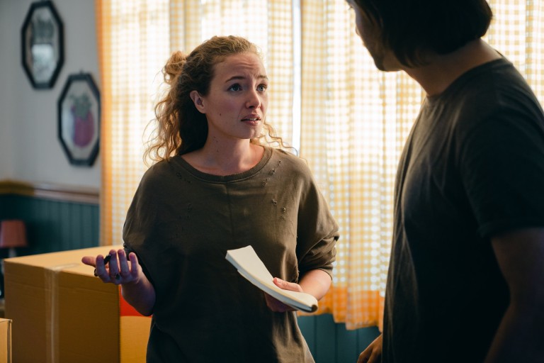Woman holding papers