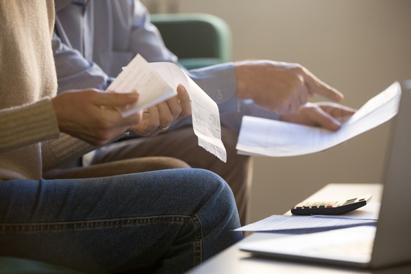 Couple looking at bills