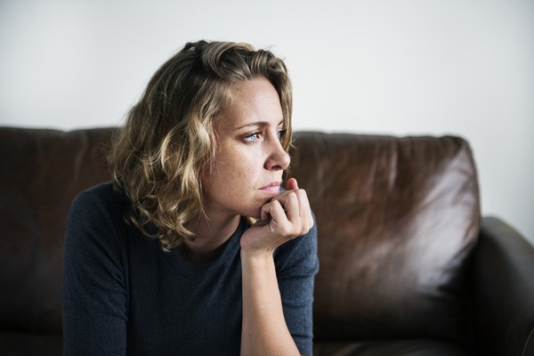 Woman staring off into the distance