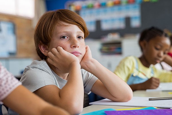 Child with a sad expression