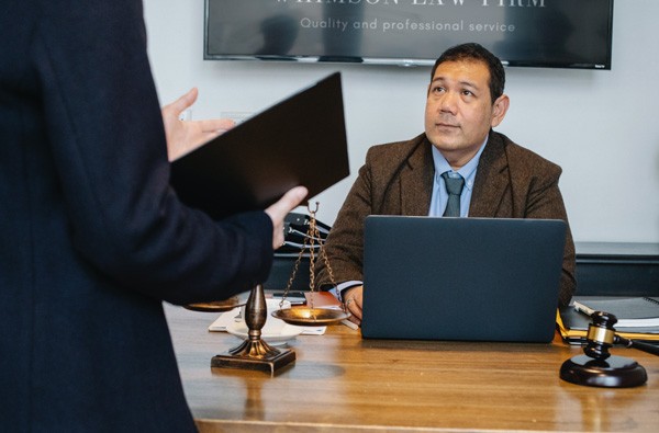 Attorney talking to a client